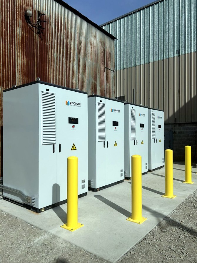 Four Discover AES 210 battery cabinets installed for demand charge reduction at industrial manufacturing facility